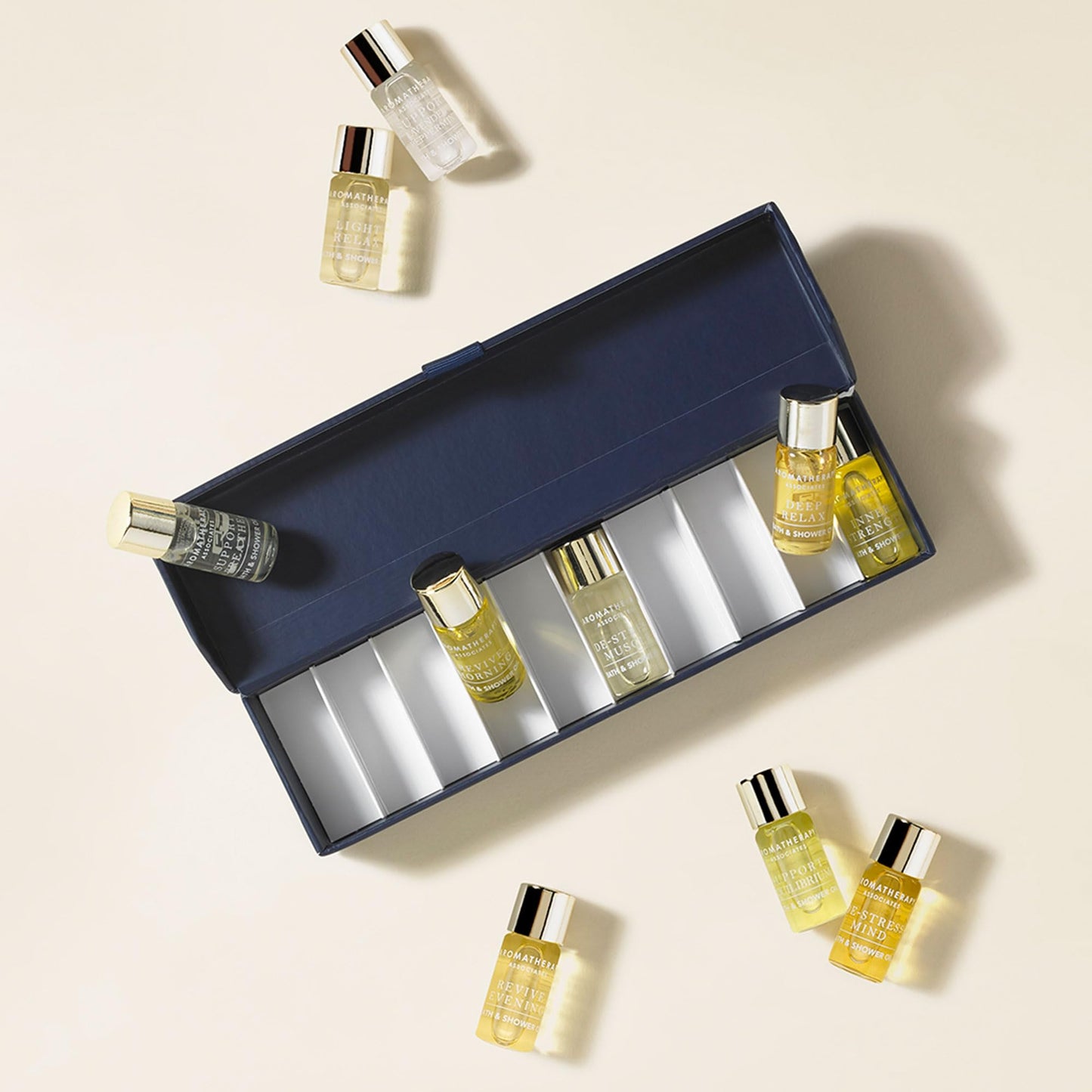 Aromatherapy Associates Ultimate Wellbeing Miniature Bath and Shower Oils, Premium Natural Body Oil Collection in a Decorative Gift Box, 10 Hydrating Body Oils, 0.10 Oz Each