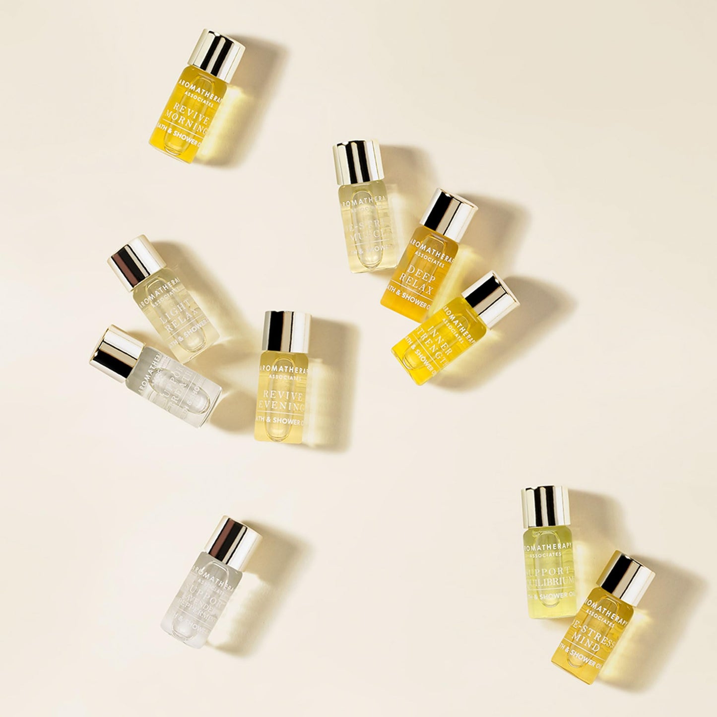 Aromatherapy Associates Ultimate Wellbeing Miniature Bath and Shower Oils, Premium Natural Body Oil Collection in a Decorative Gift Box, 10 Hydrating Body Oils, 0.10 Oz Each